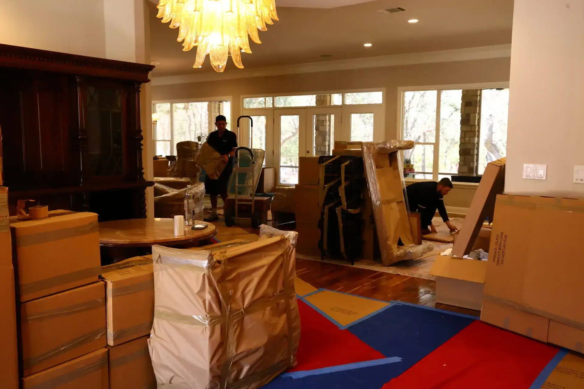 Protective runners and packed belongings