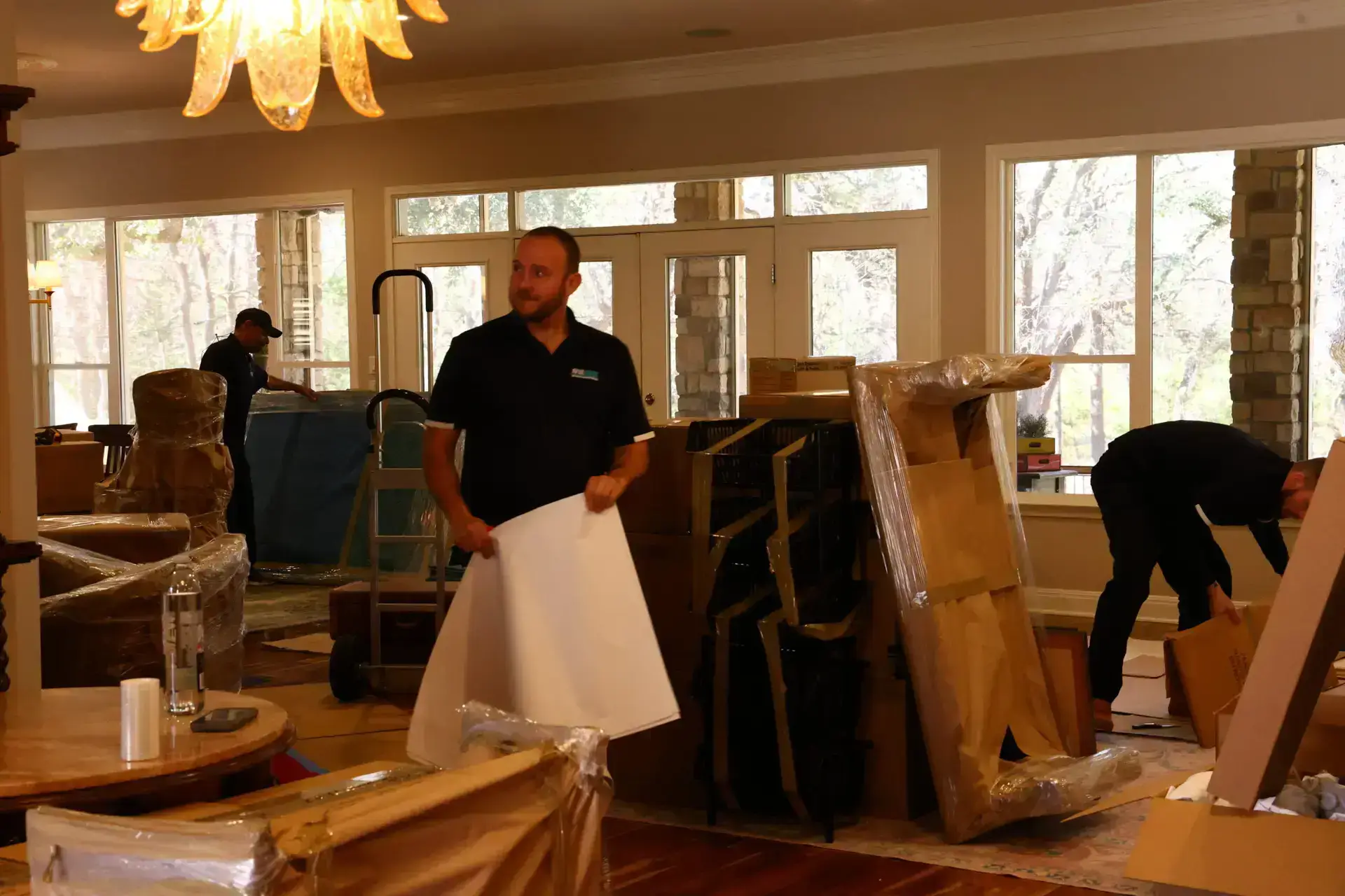 First Class crew preparing household furniture