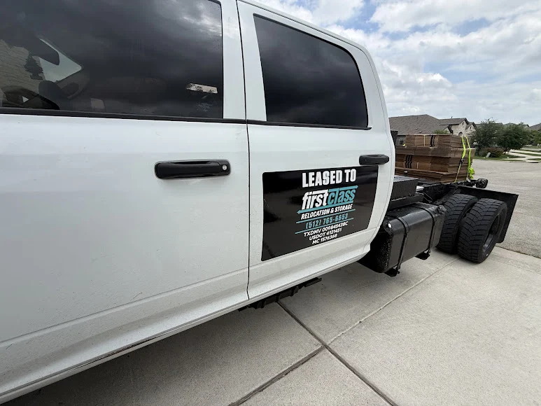 First Class truck with Leander company branding